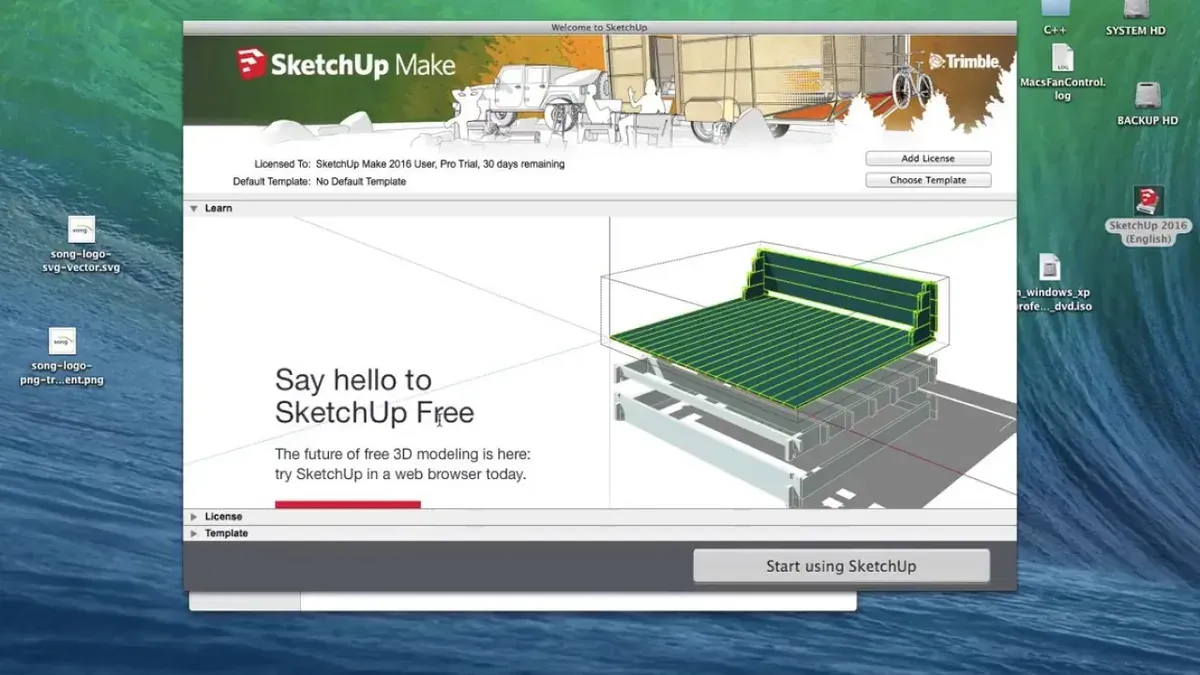Person installing SketchUp on MacBook showing installation process on screen