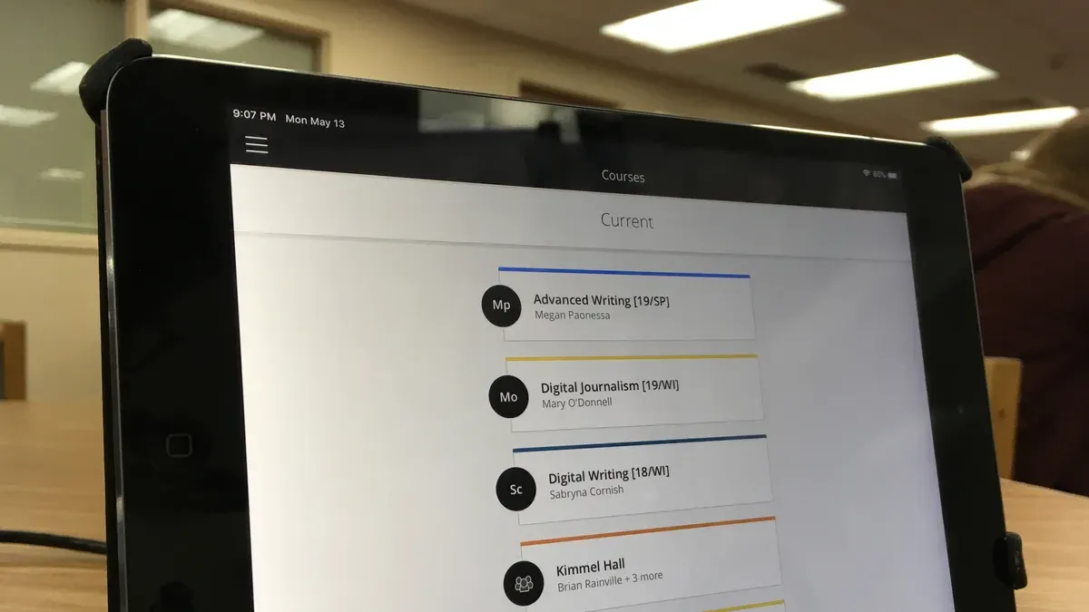 Moving from iPads to Chromebooks checklist shown during staff training in classroom