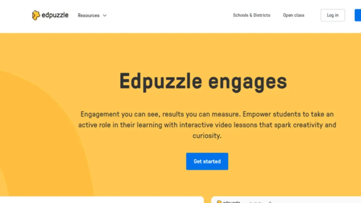 Teacher demonstrating switching from Edpuzzle to Blooket on laptop with engaged students