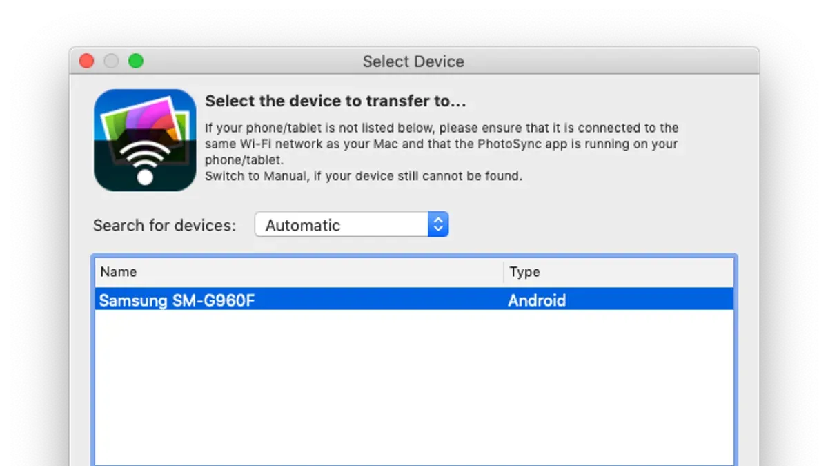 Person switching from MacBooks to Android tablets using both devices at a desk