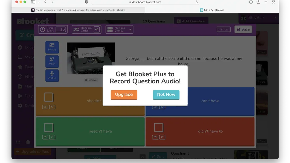 Educator guiding students through switching from Quizizz to Blooket on classroom projector