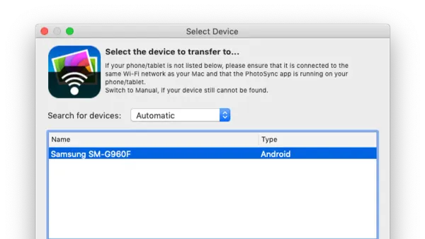 Person switching from MacBooks to Android tablets using both devices at a desk