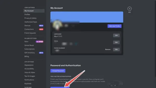 Person enabling two-factor authentication on Discord using smartphone